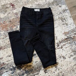 Free People Black Skinny Jeans with Subtle Distressing